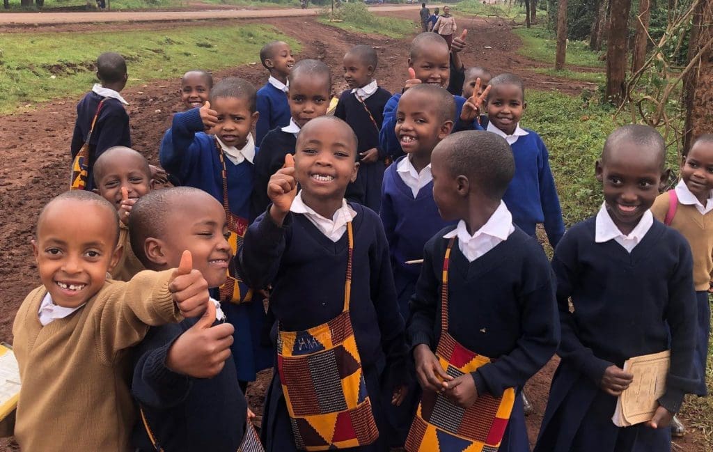 one of our milestones, maasai girls on their way to school