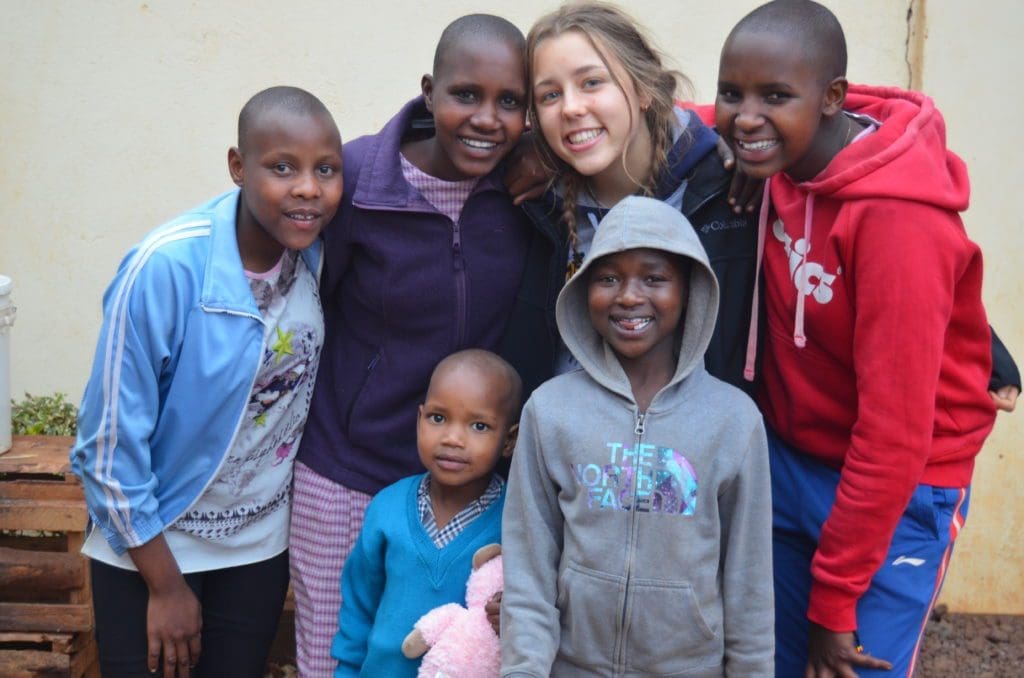 The girls loved posing for photos with the volunteers, especially Grace.