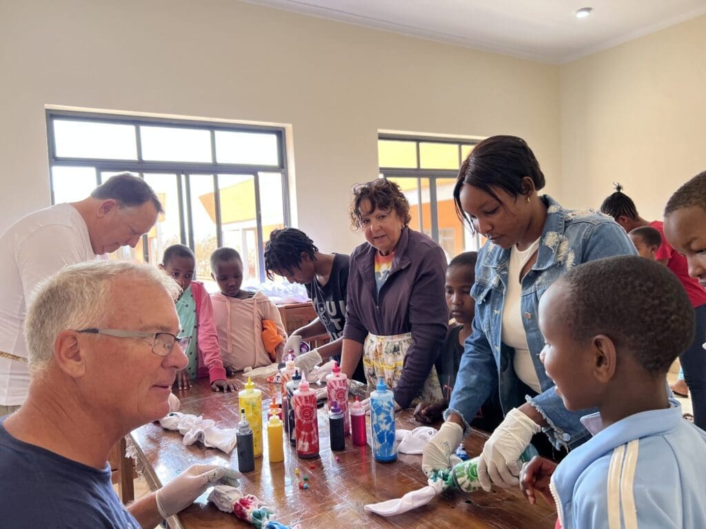 Ways to give Volunteers work with the staff and the girls demostrating ways to give back.