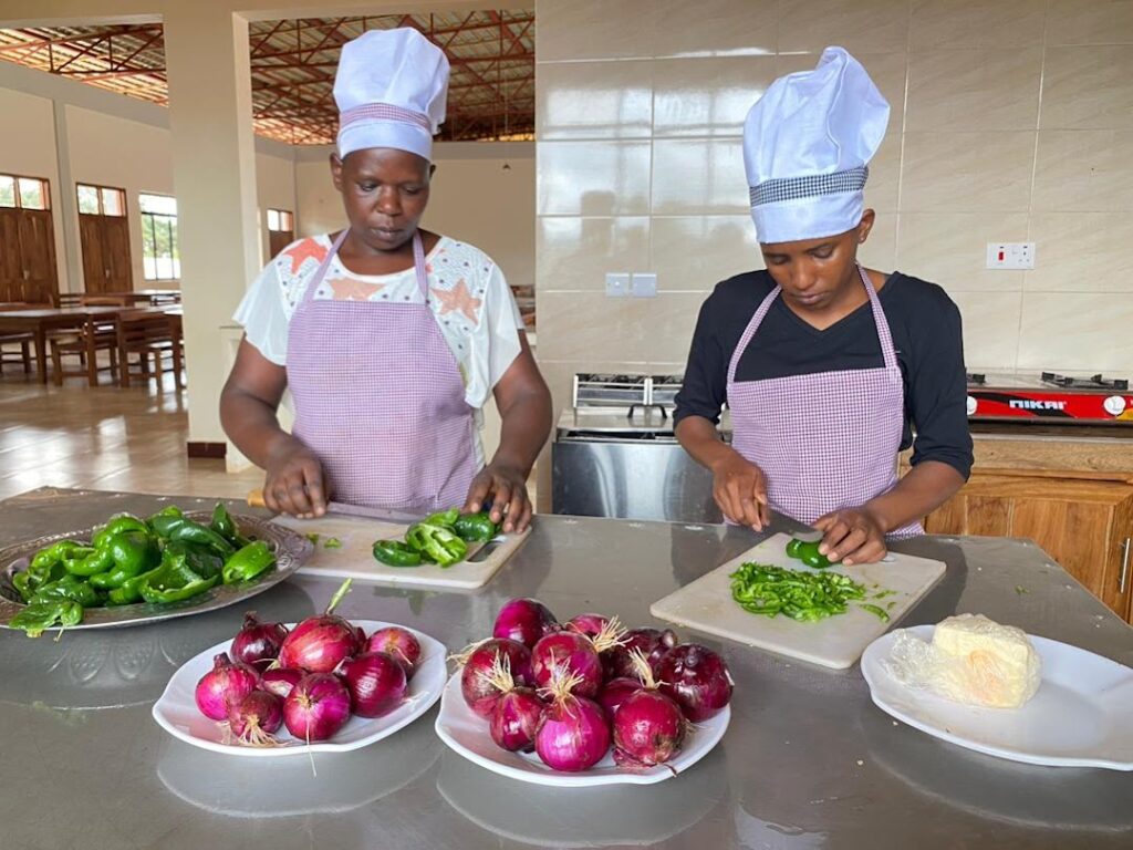 MGRC ecoVillage interns learning to cook with ingredients from the ecofarm