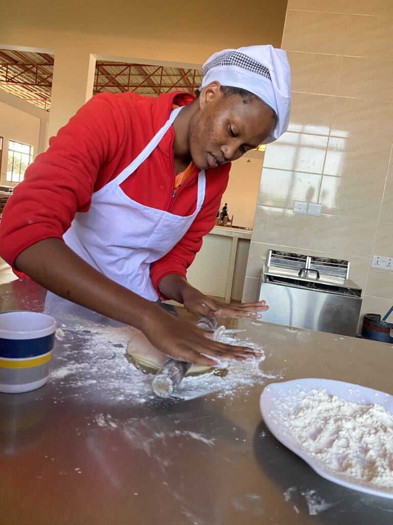 Yeyolai learning to make samosas.