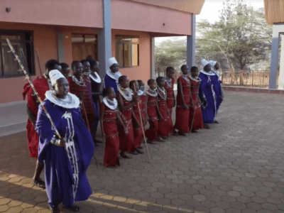 Purposeful travel experience featuring traditional Maasai dancing and singing