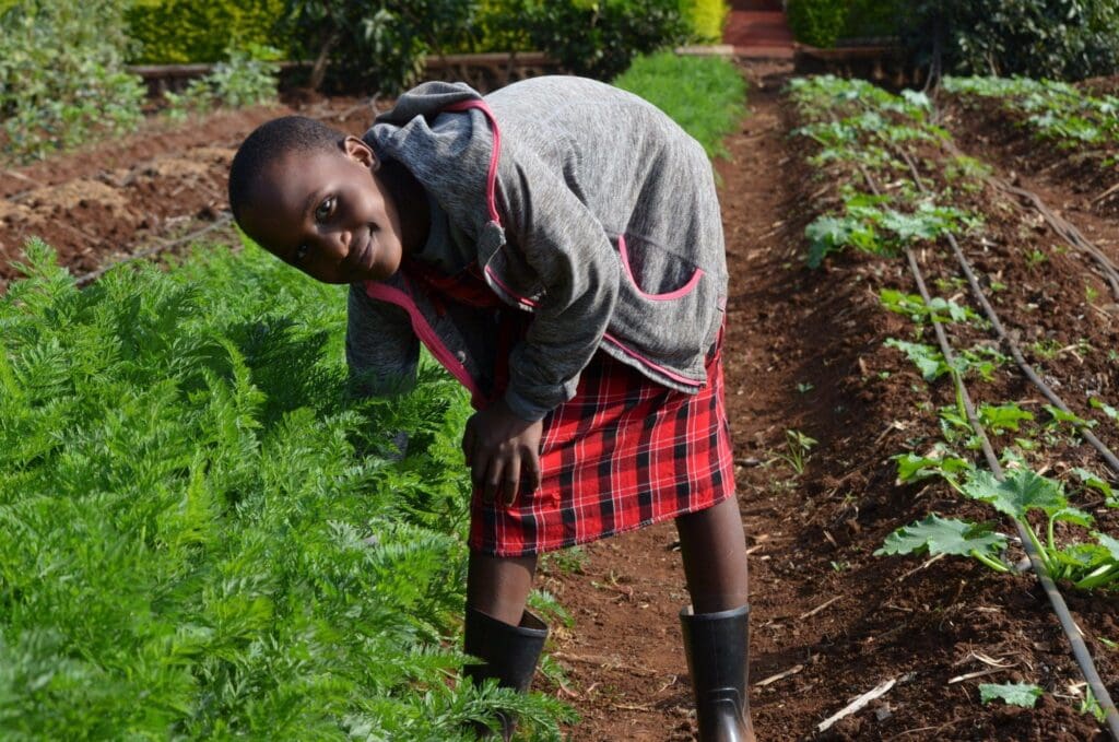 empowering Maasai girls about sustainable farming techniques at MGRC ecoFarm