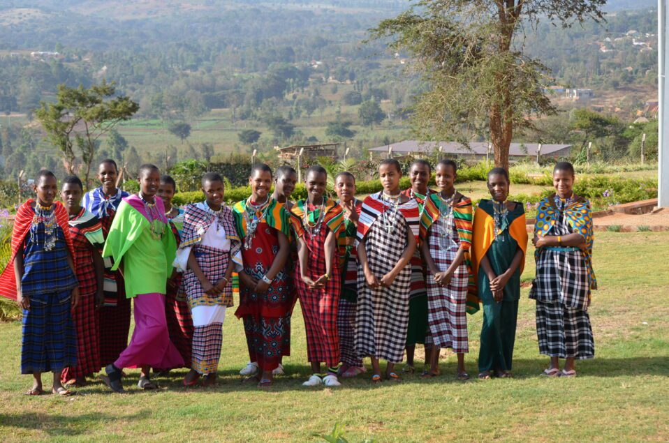 Young Maasai women in a group photo at MGRC ecoVillage