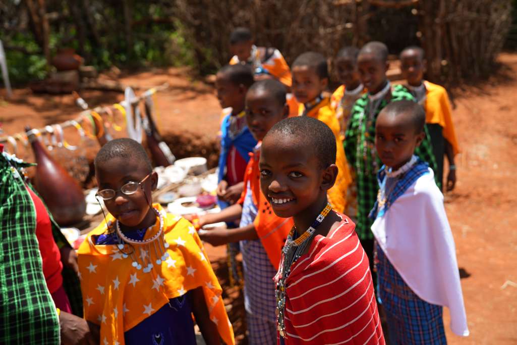 maasai girls smiling during spring activites at mgrc