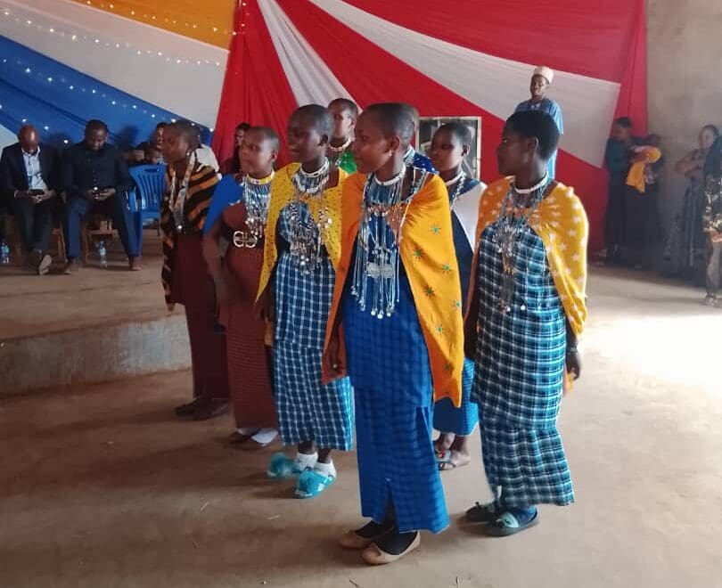 girls celebrating their educational empowerment at a ceremony