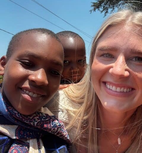 Selfie with Maasai girls outdoors at MGRC ecoVillage
